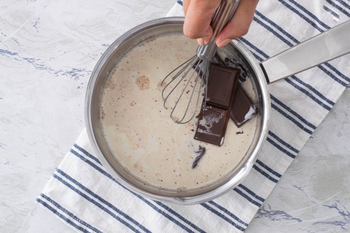Add the curd to the melted chocolate