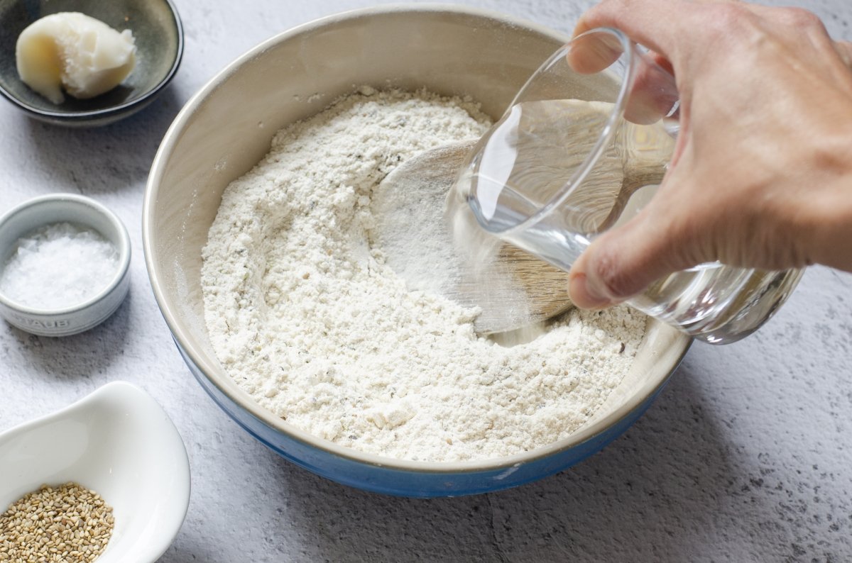 Add water to the flour of the crackers