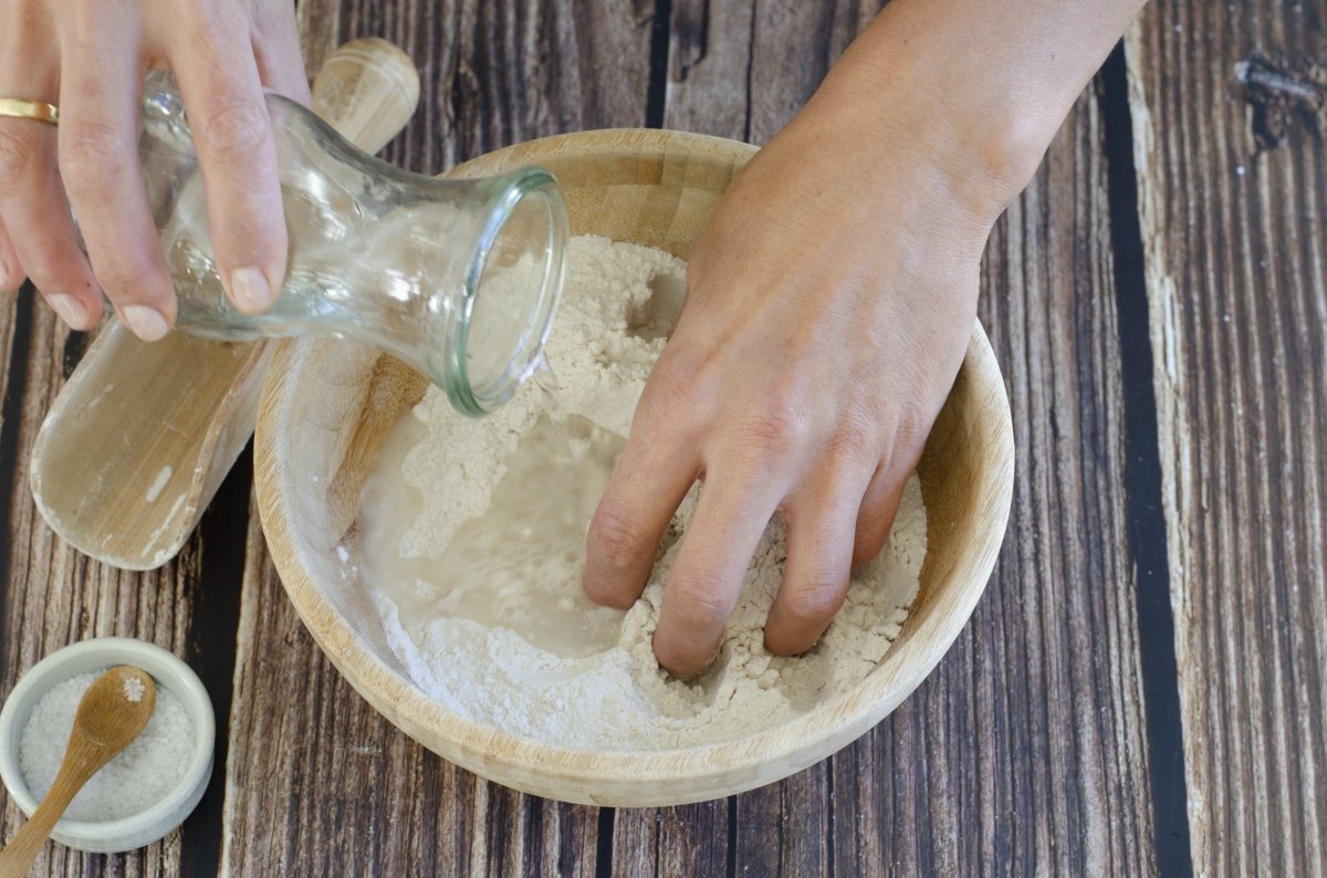 Add the water and yeast to the flour