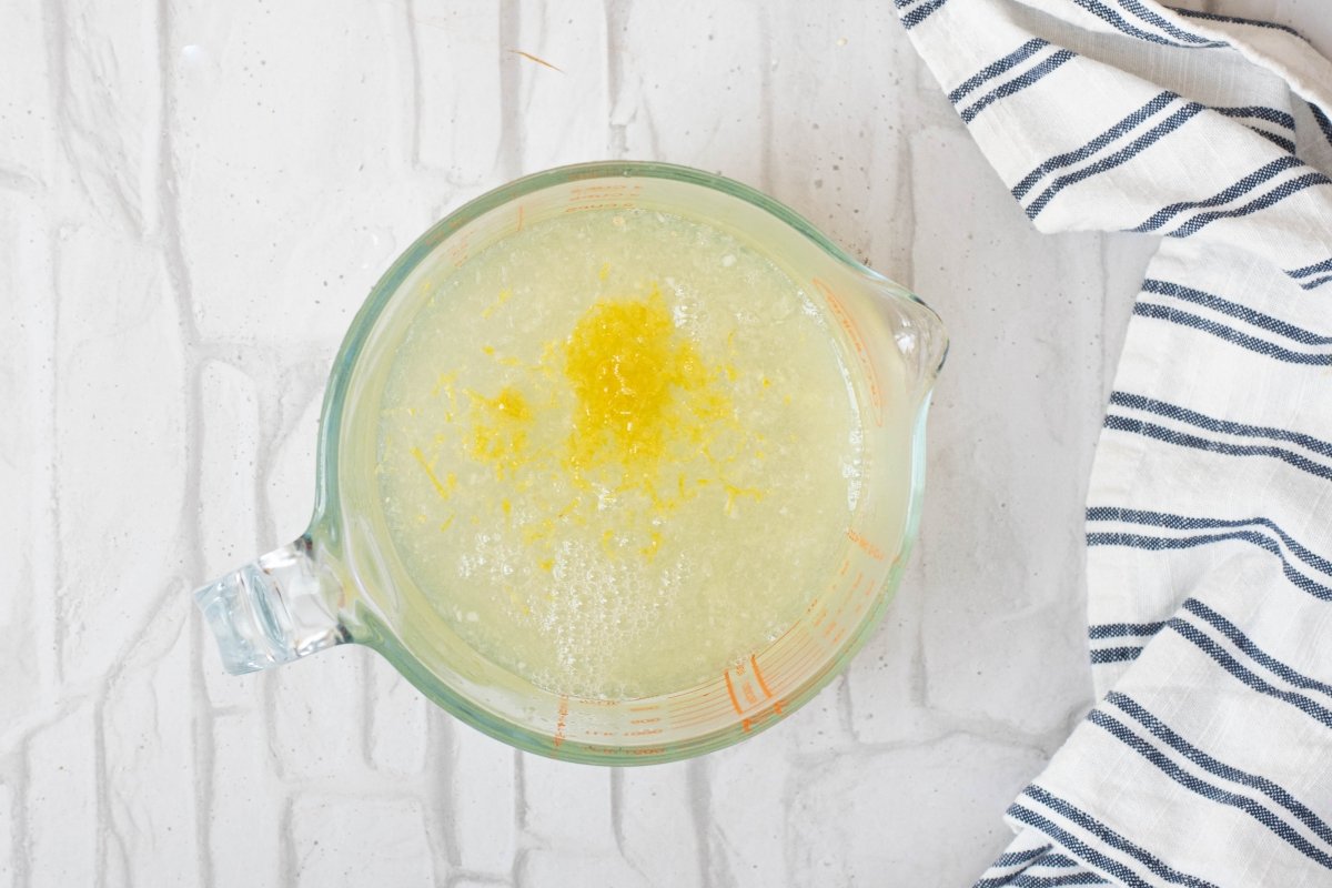Add the juice and lemon zest from the homemade lemon popsicles