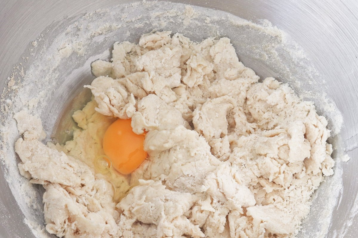 Add egg to the cinnamon roll dough