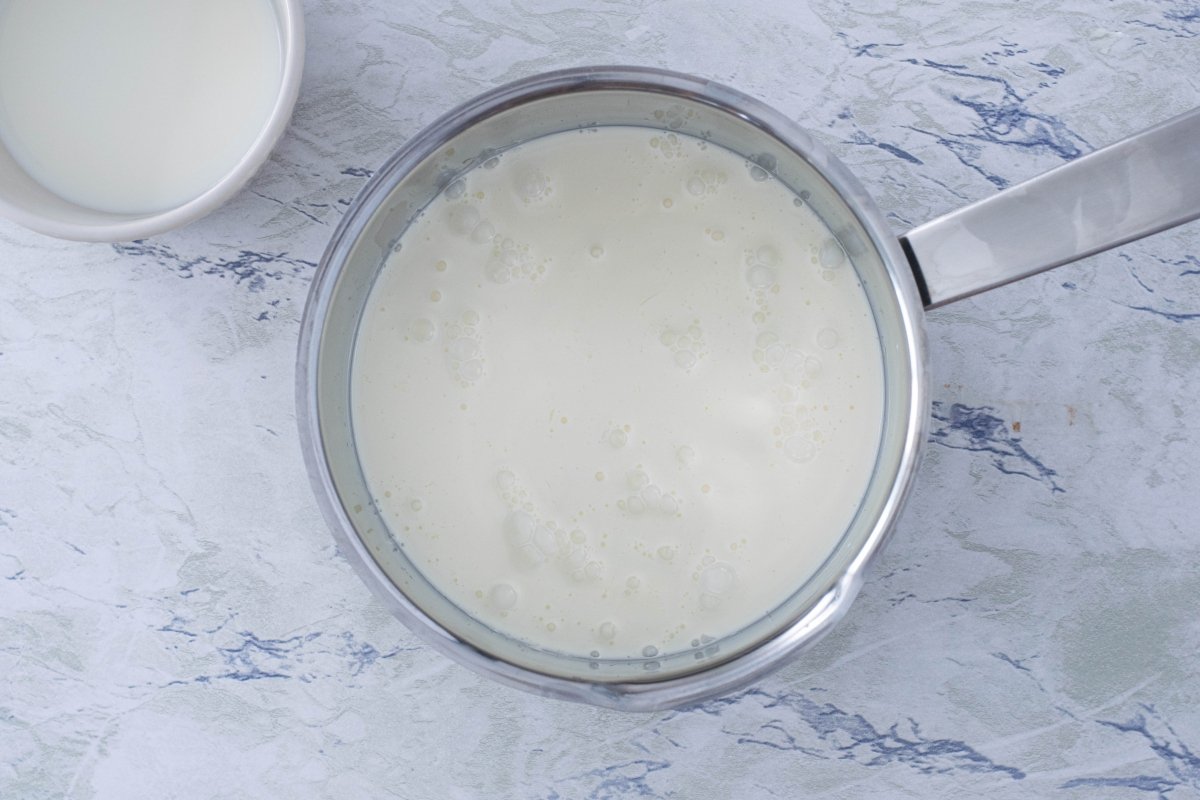 Heat the cream and milk
