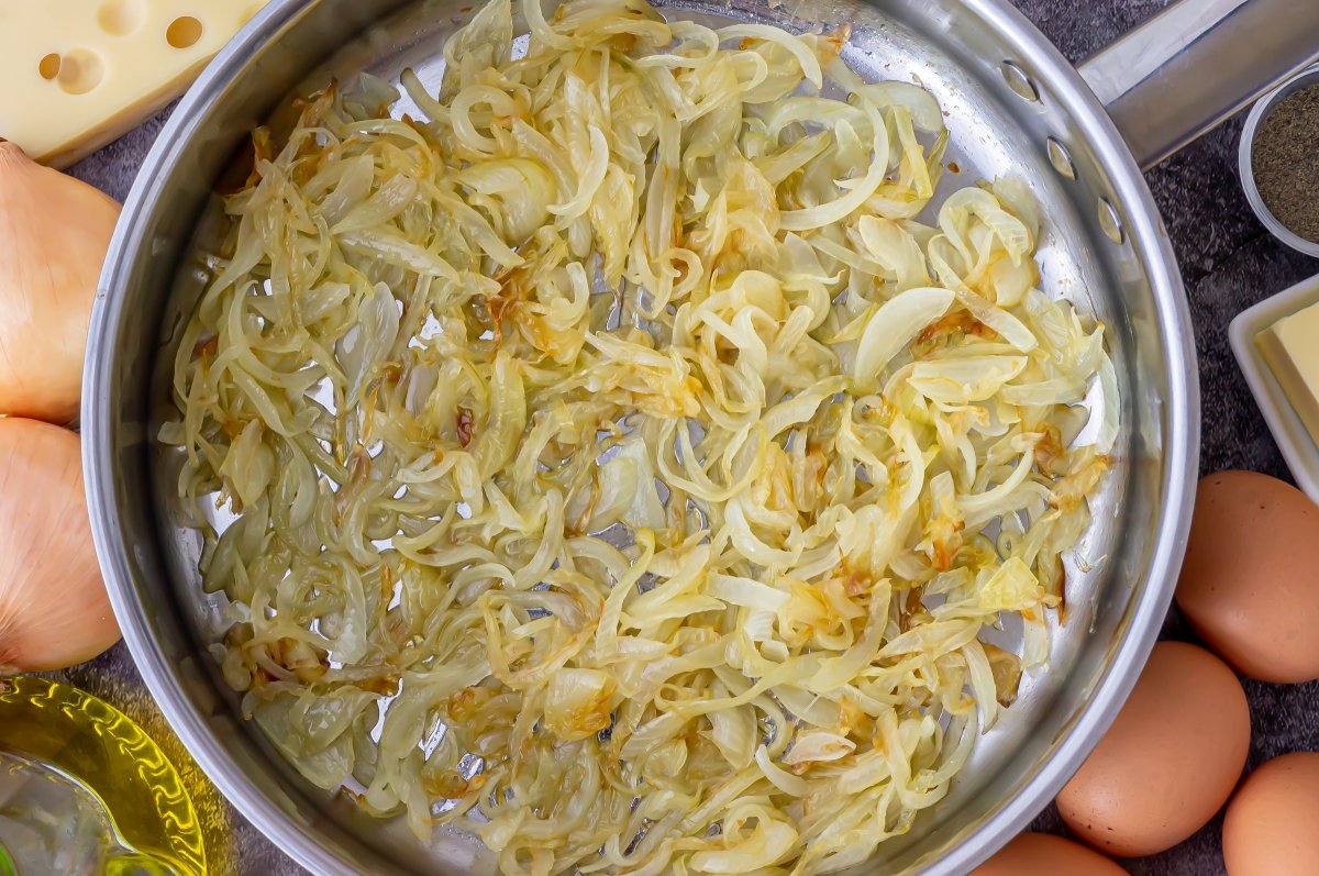 Poached onion for Paraguayan soup