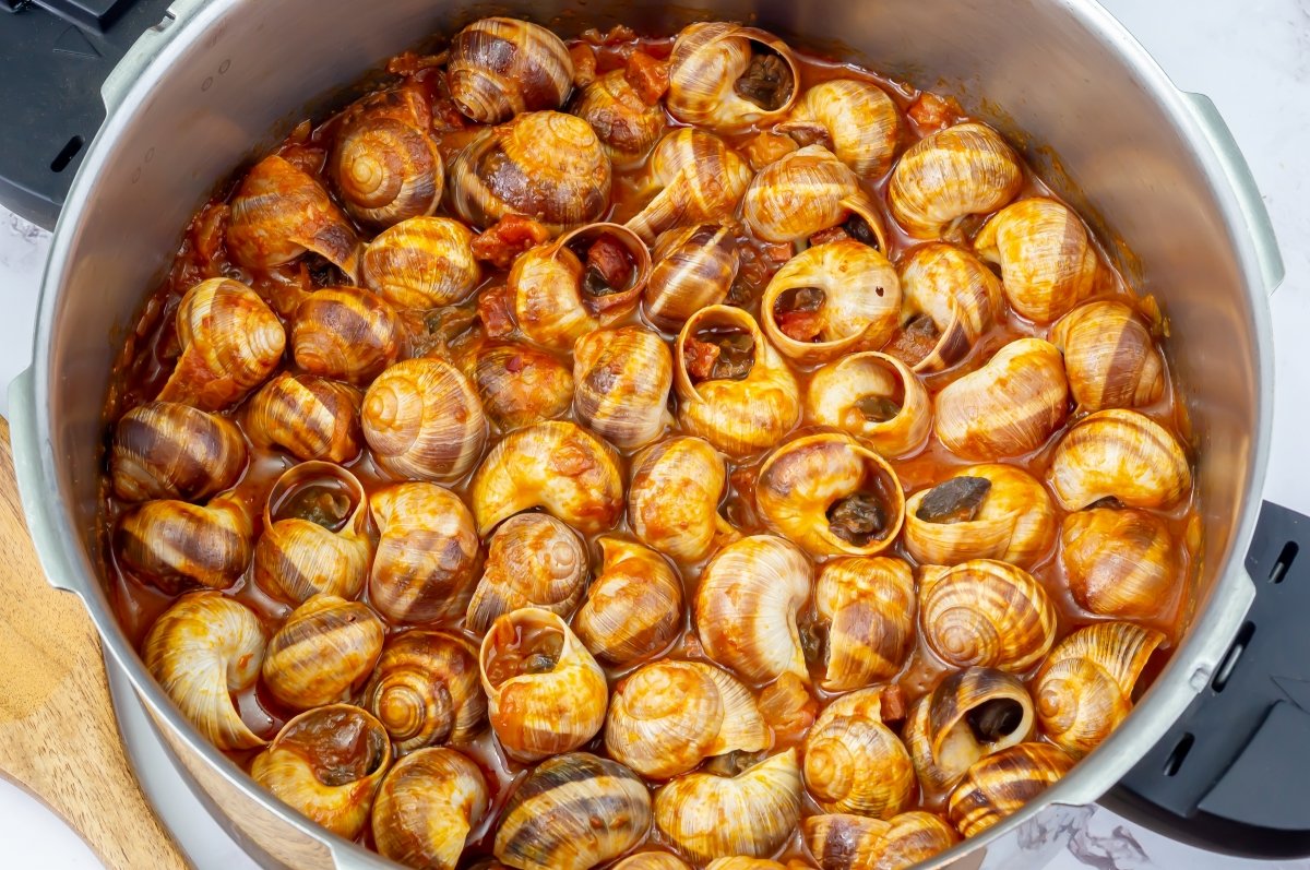 Cocción de los caracoles en salsa