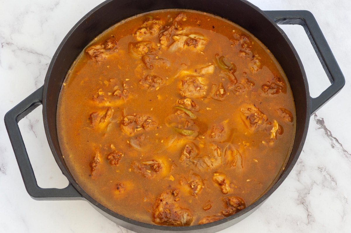 Cocción del vindaloo de cerdo
