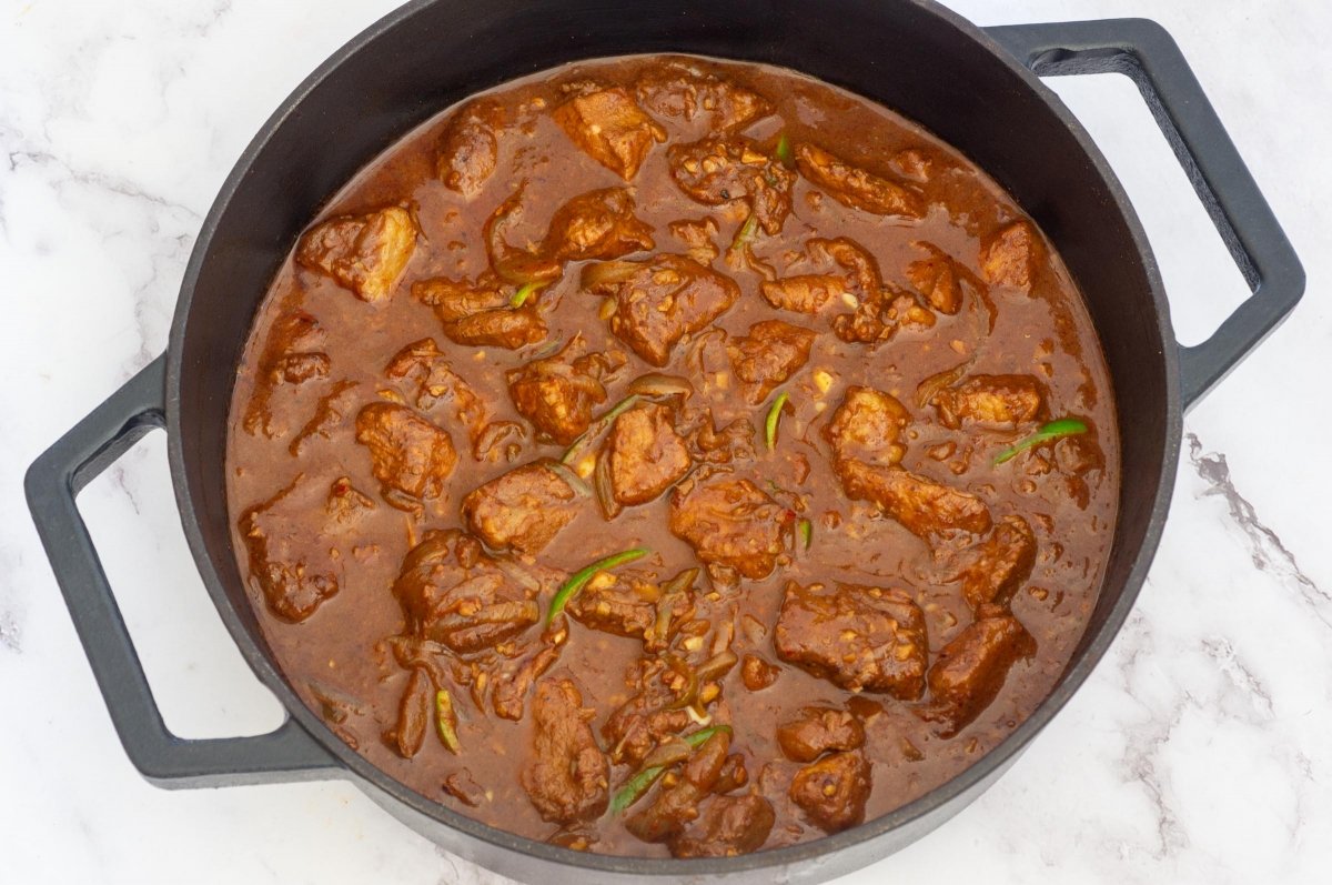 Cocer el vindaloo de cerdo