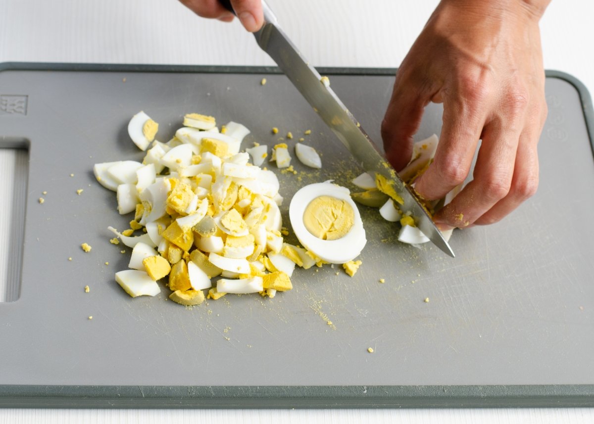 We cut the hard-boiled eggs for the chickpea salad