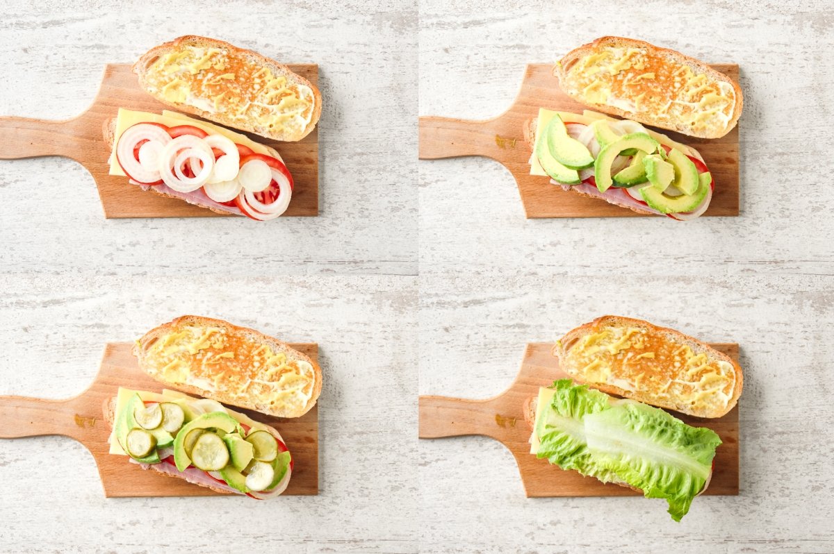 Cubrimos con tomate, cebolla, aguacate, pepinillos y lechuga