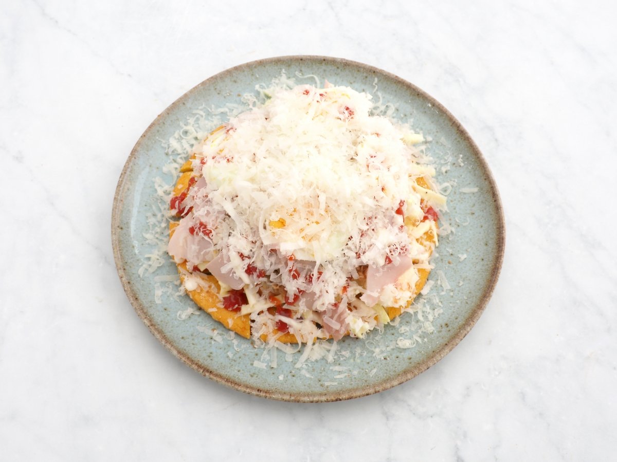 Cubrir con queso rallado