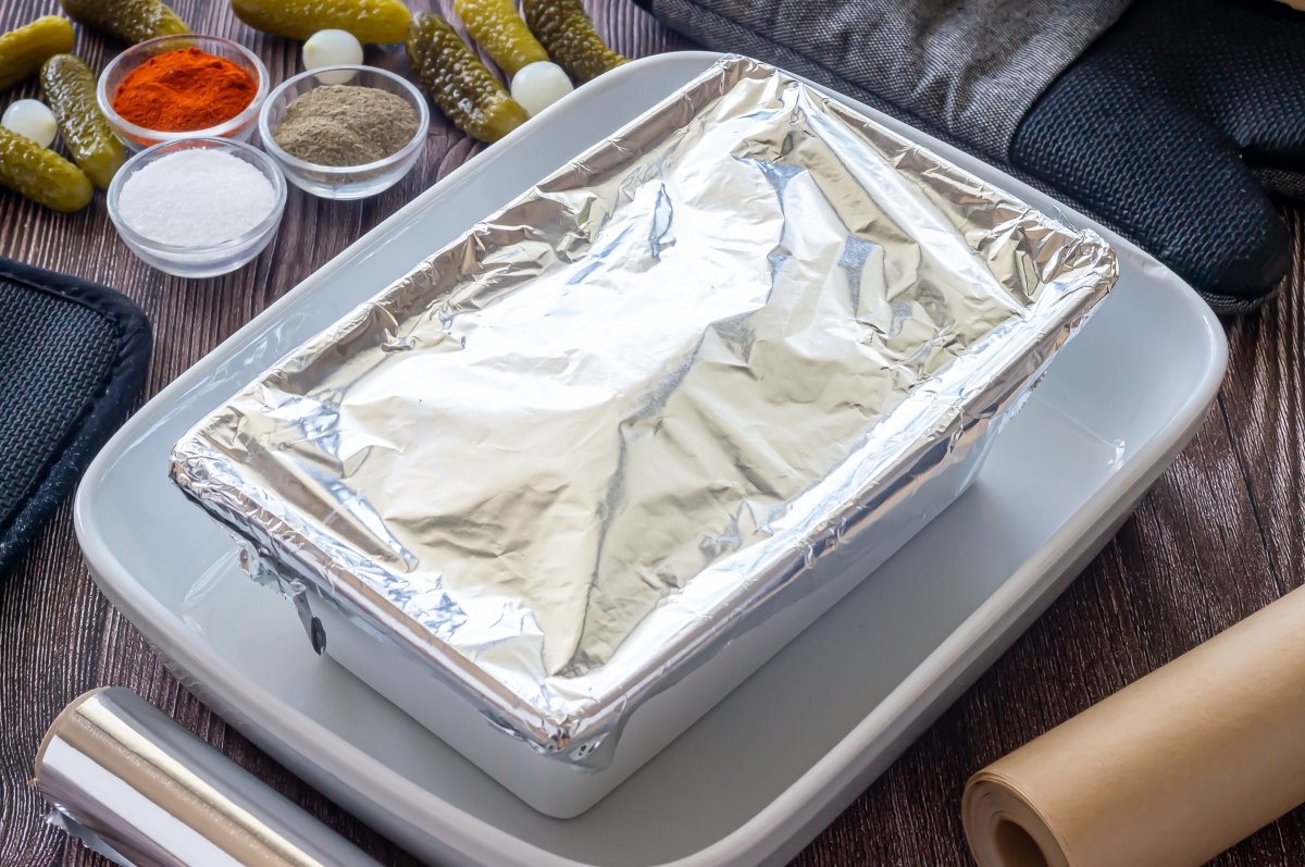 Cover the terrine with aluminum foil