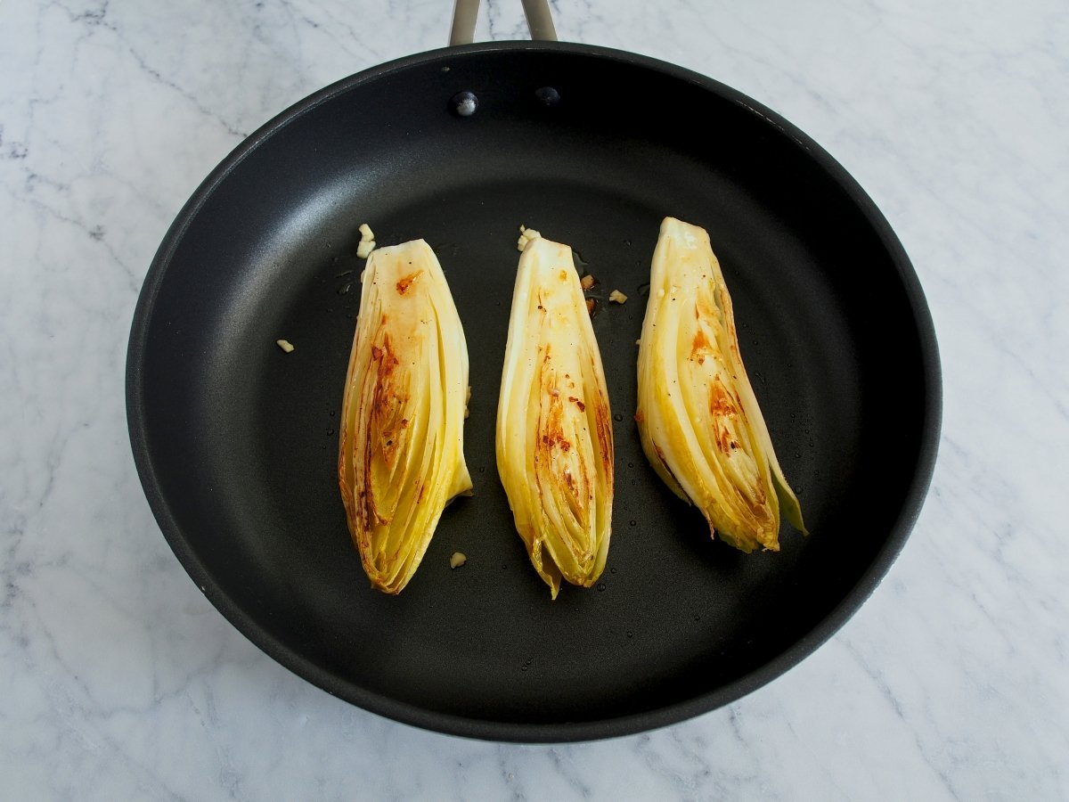 Flip the endives and cook for another 2 minutes.