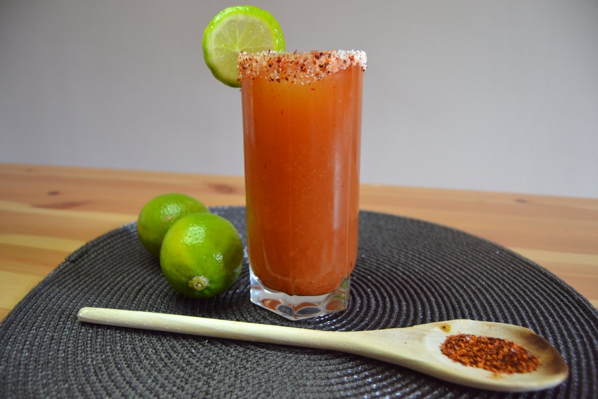 Garnish with a slice of lime