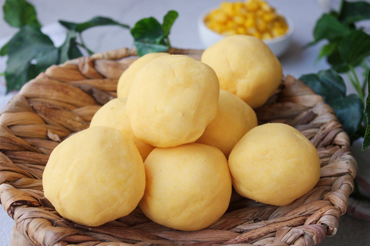 Dividing the dough to make homemade arepas