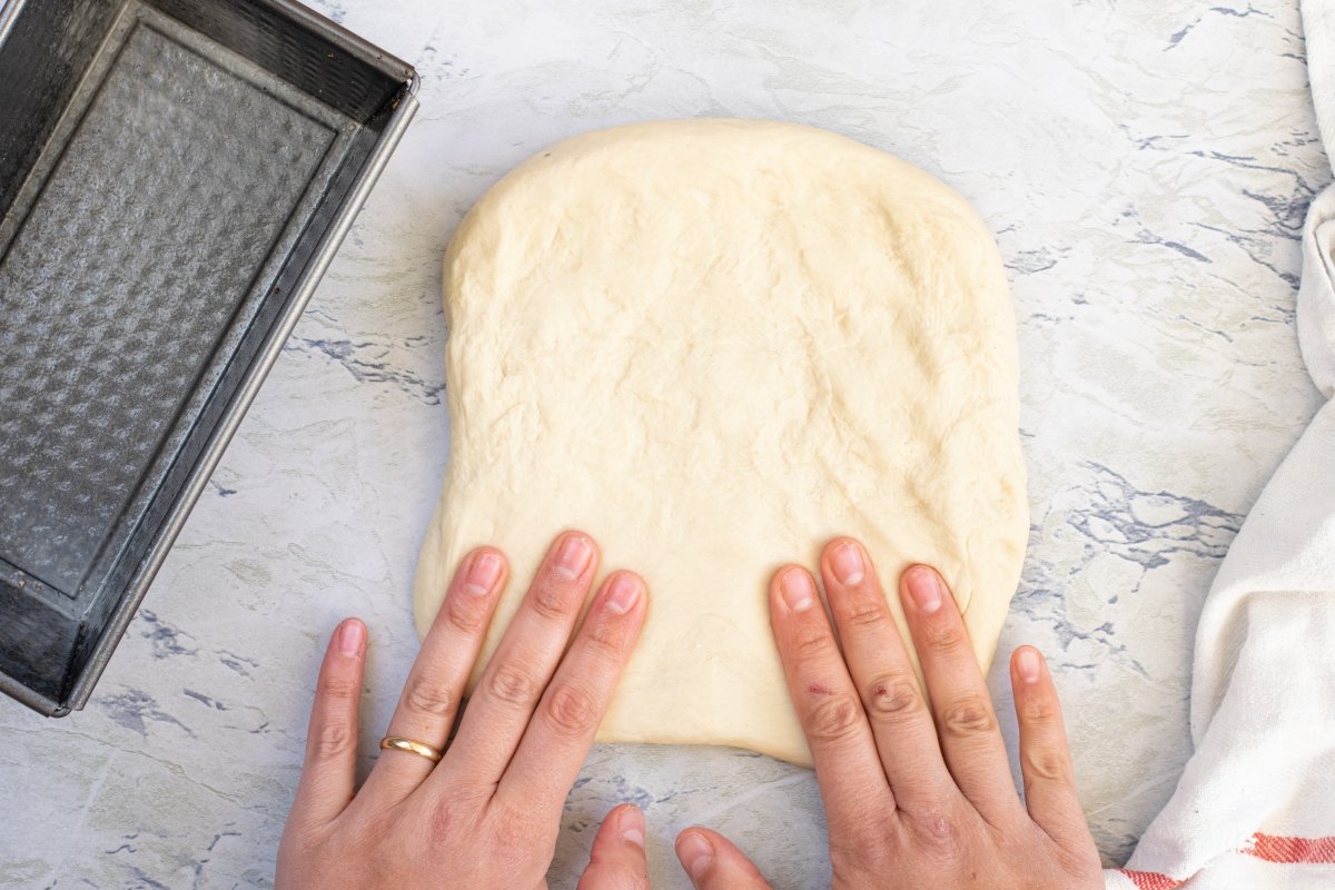 Stretch the dough for sliced bread