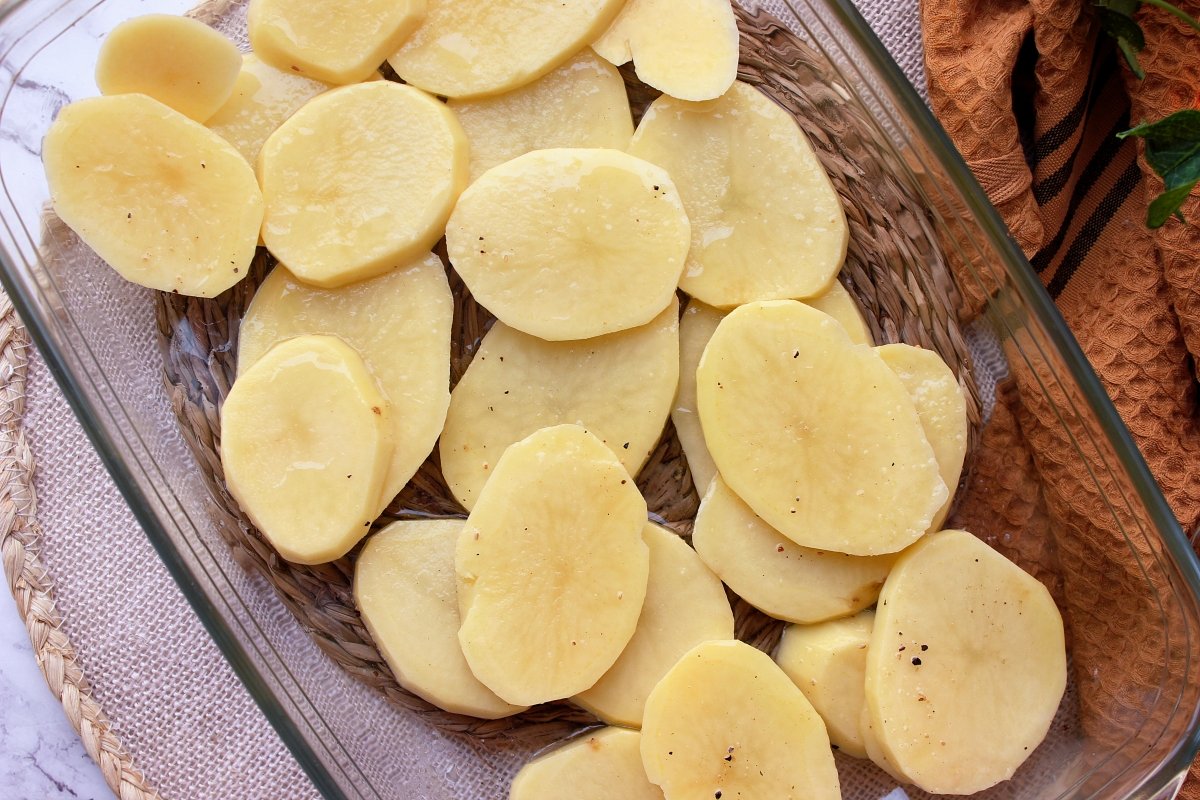 Peel and cut 400g potatoes