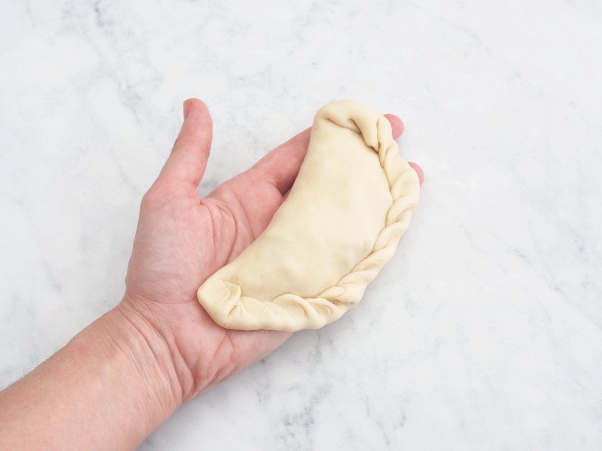 Hacer el repulgue de las empanadas