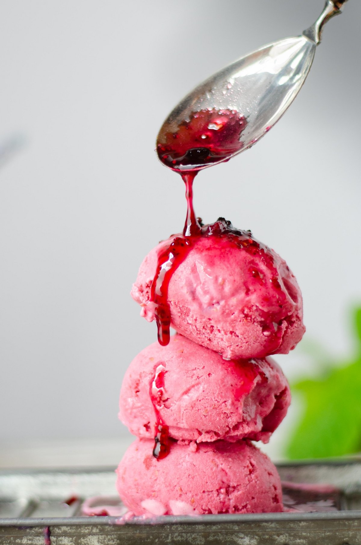 Raspberry ice cream with syrup