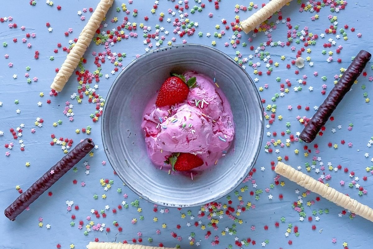 Strawberry ice cream decorated with wafers