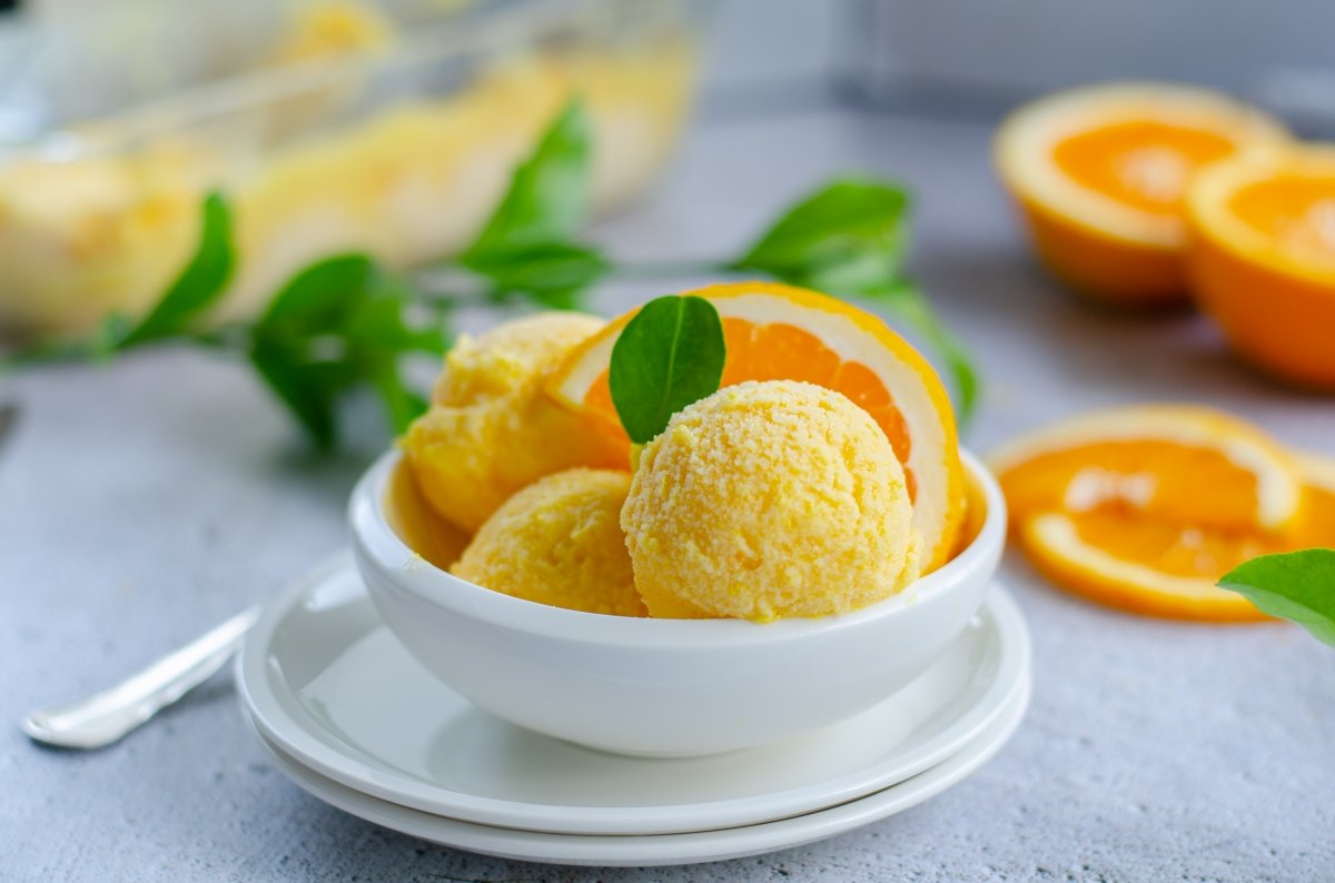 Orange ice cream in a bowl