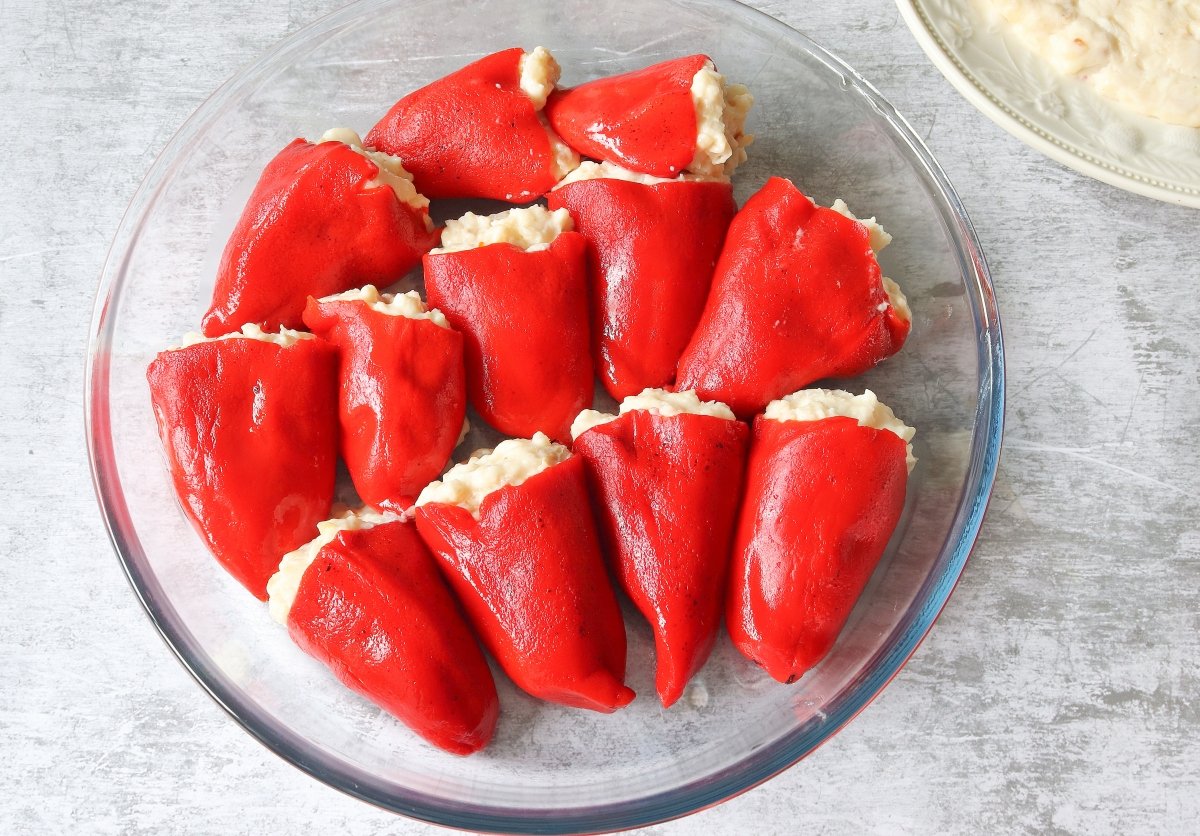 Cook hake-stuffed piquillo peppers