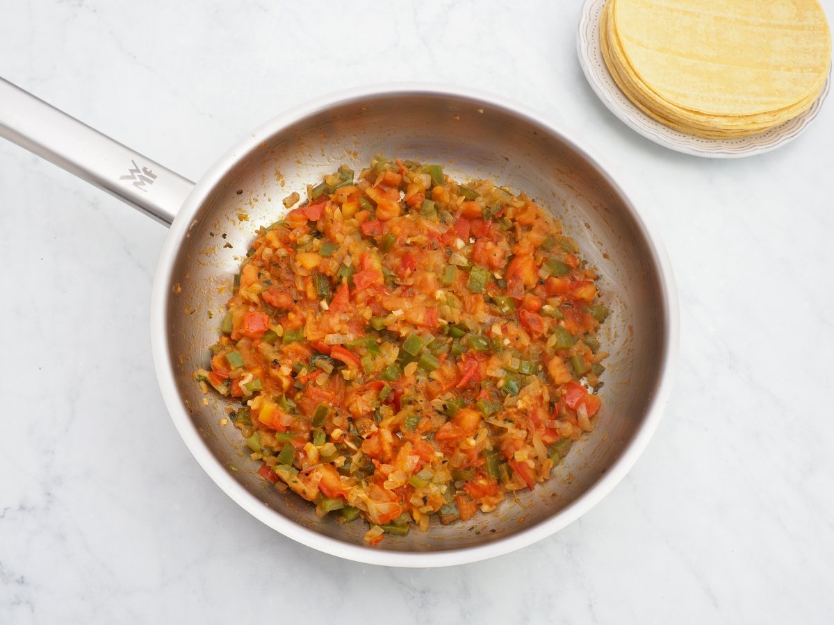 Incorporar el tomate al sofrito
