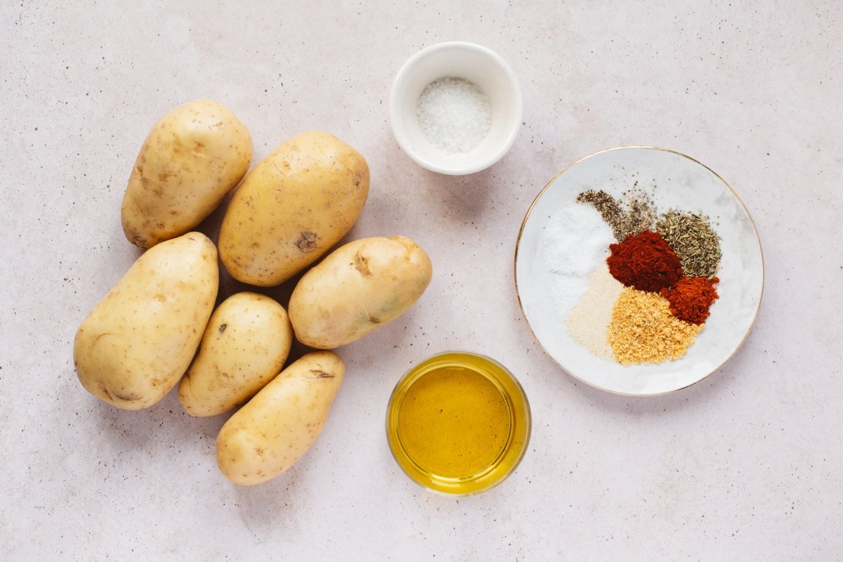 Ingredientes de las patatas gajo especiadas deluxe