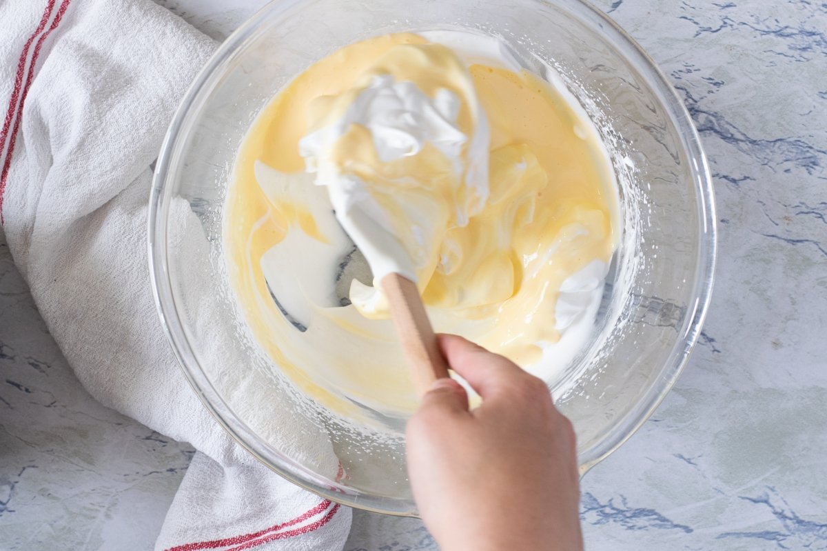 We integrate the egg whites into the Japanese cheesecake mixture