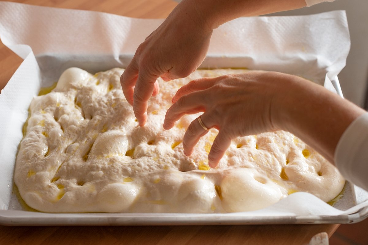 We mark the focaccia with our fingers