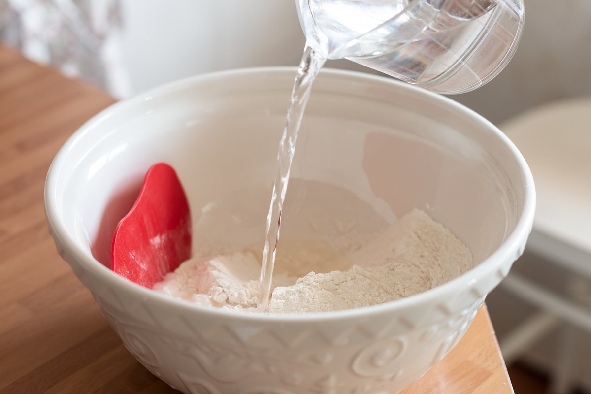 Mix the water with the focaccia yeast