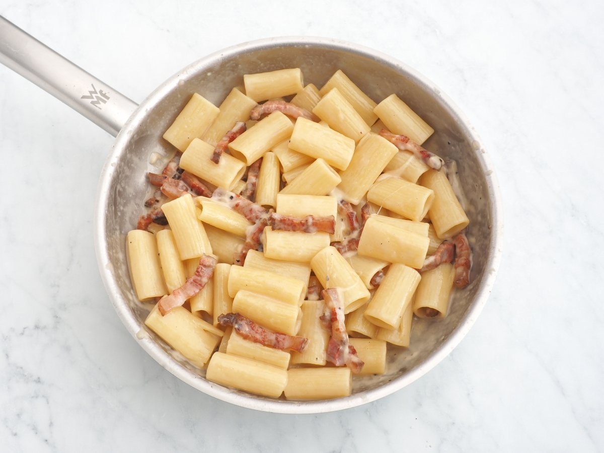 Mezclar hasta que se funda el queso