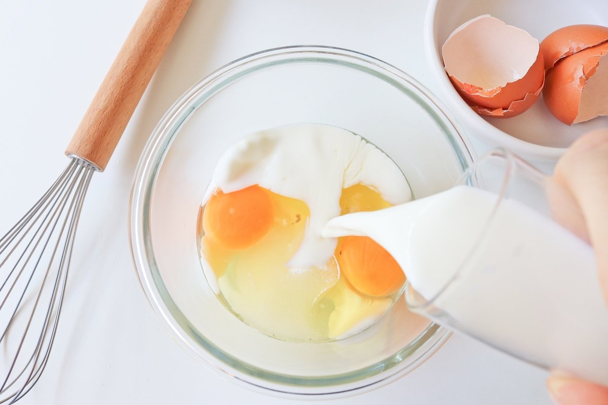 whisk together 2 eggs with milk and sugar