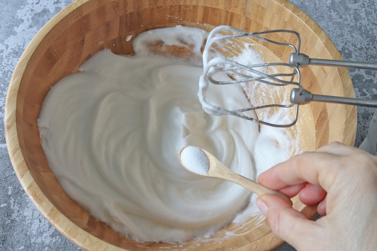 Whip egg whites with baking soda for cloud bread