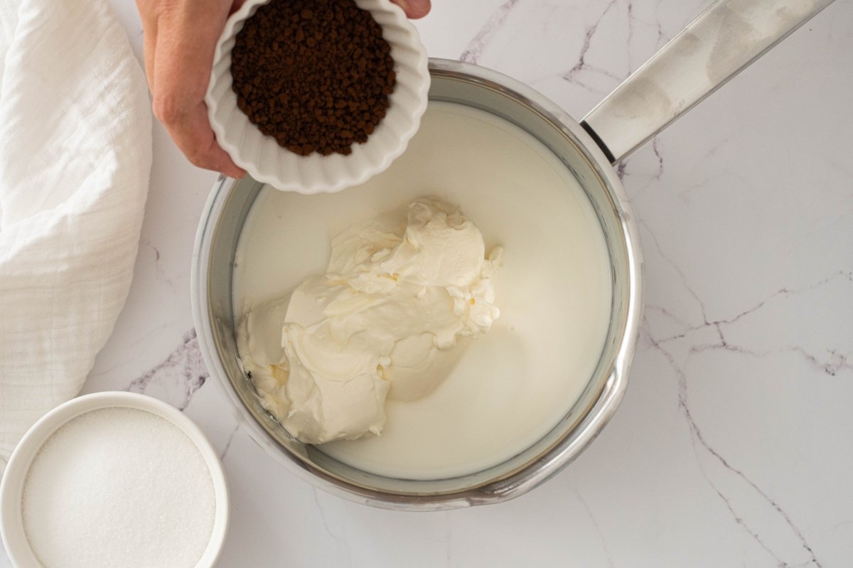 Whip the cream with the soluble coffee to make the coffee ice cream