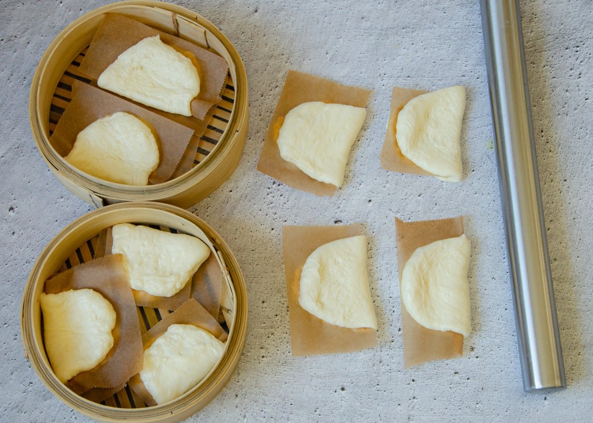 Homemade bao breads formed and rising