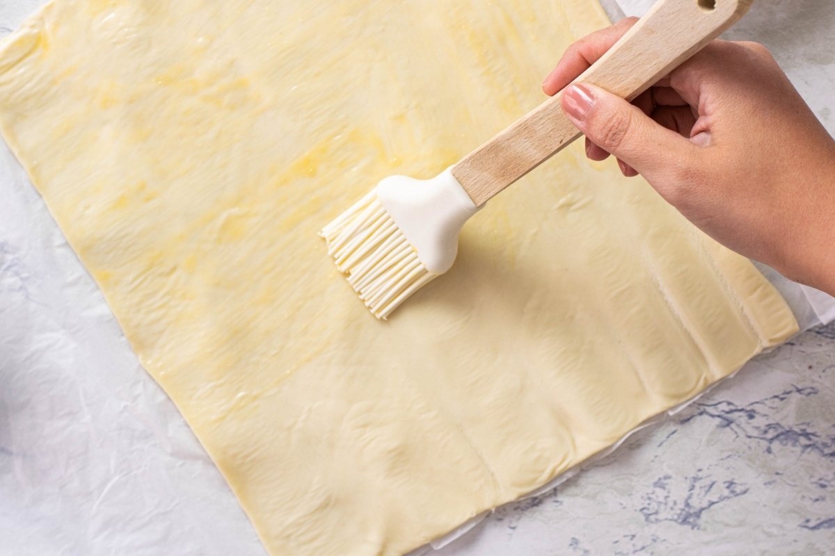 Brush the puff pastry braid with egg.