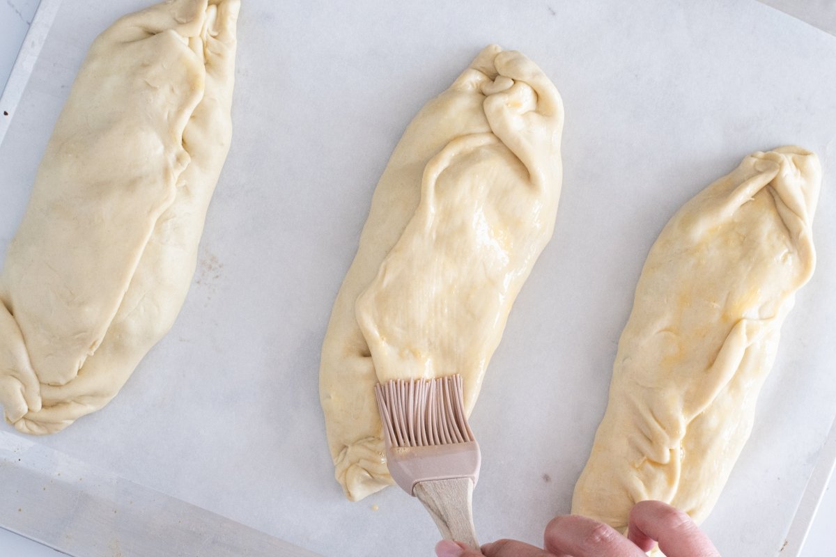 PIncelamos con huevo los panadons