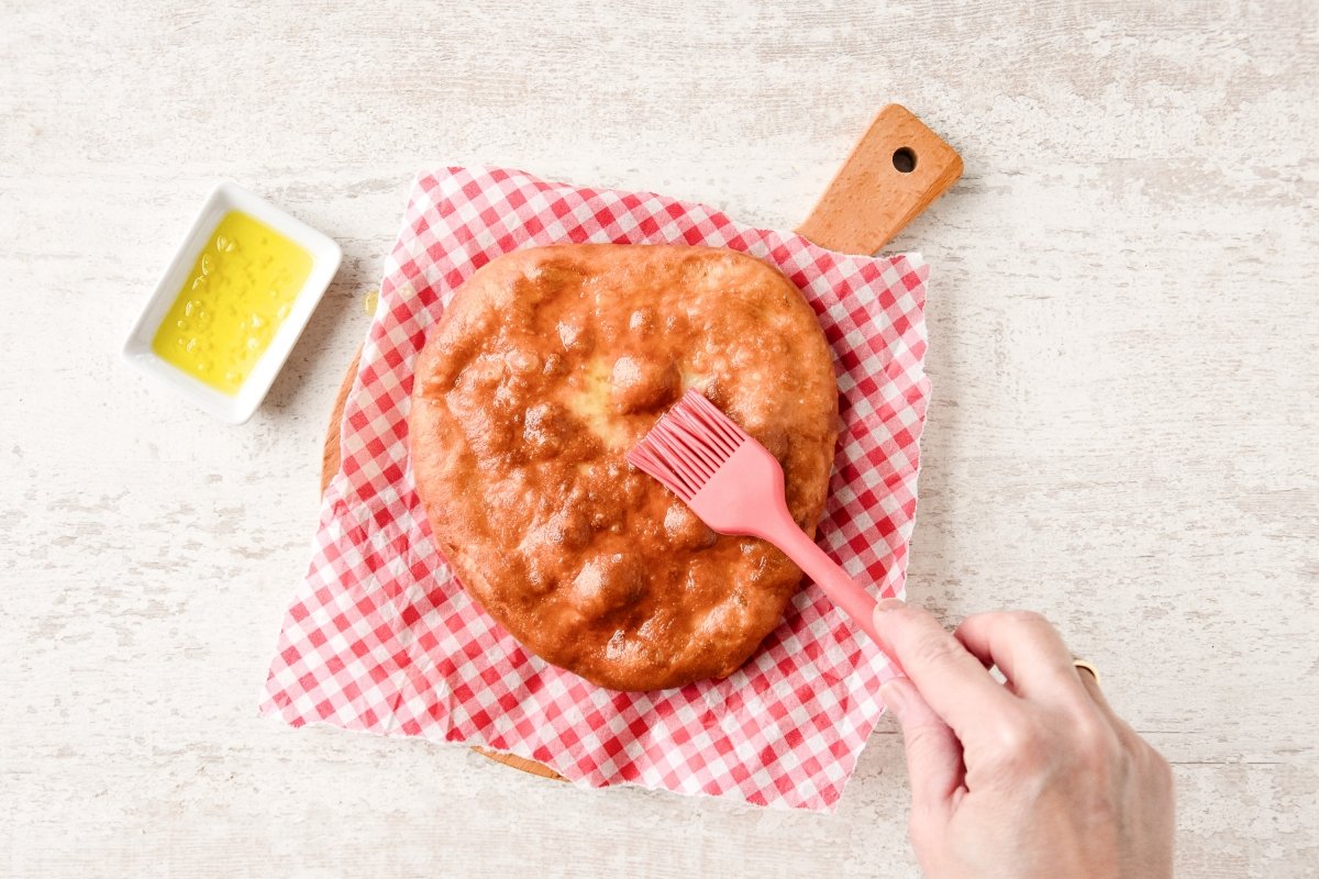 Pintamos con la mezcla de ajo y aceite