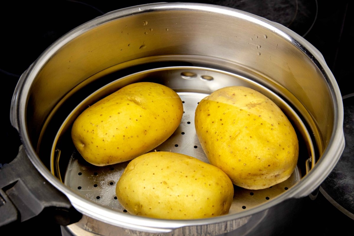 Boil the potatoes in a pot