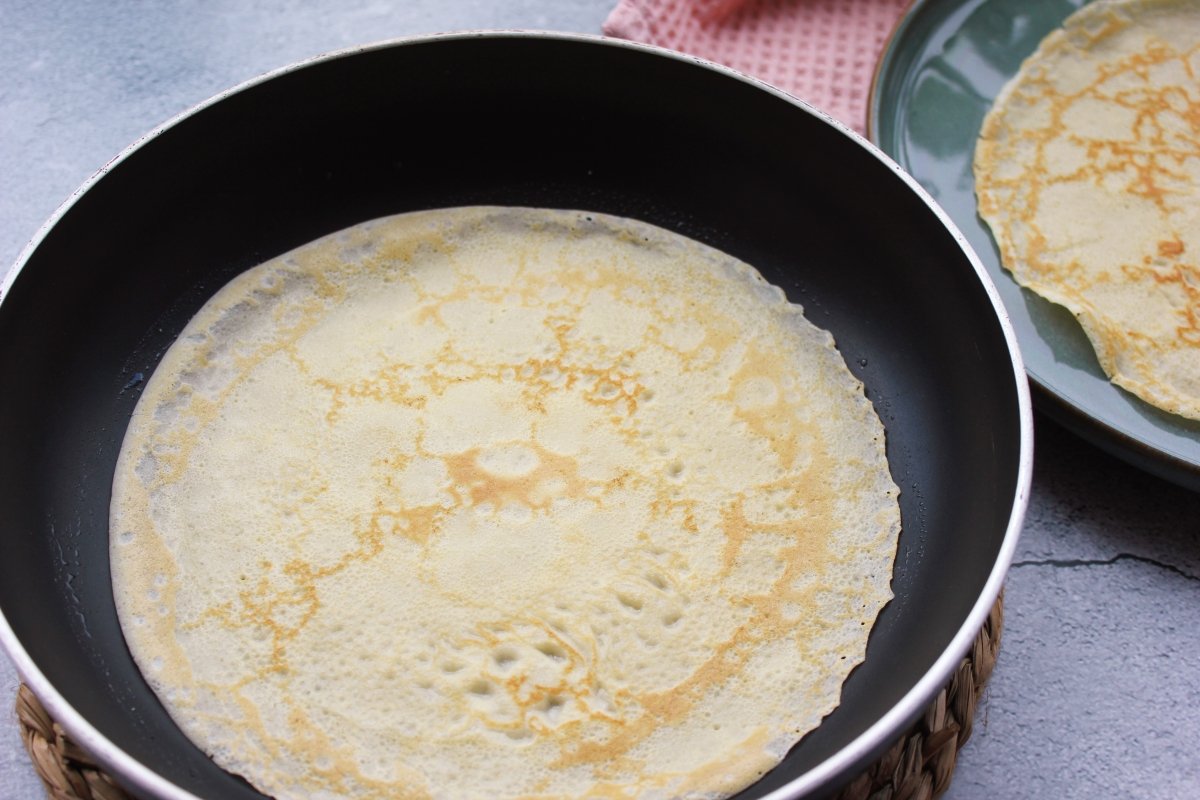 Process of cooking pancakes on the other side