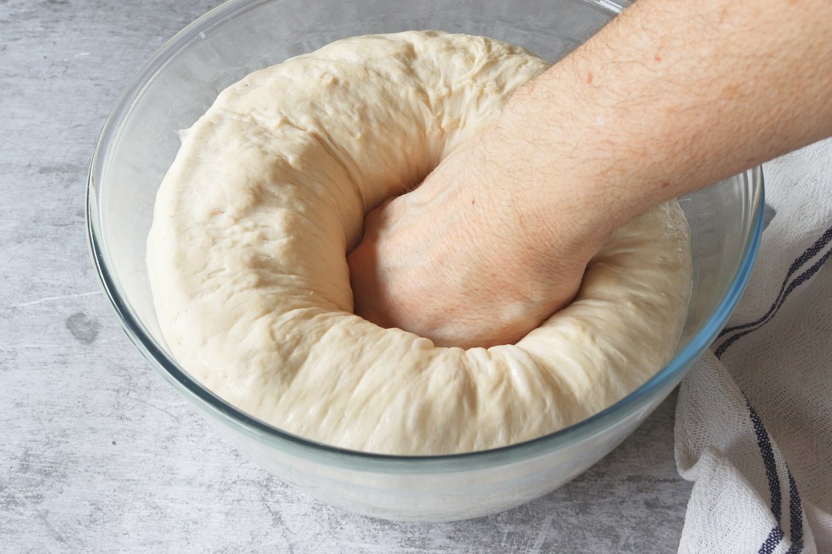 Remove the air from the dough rustic wheat bread