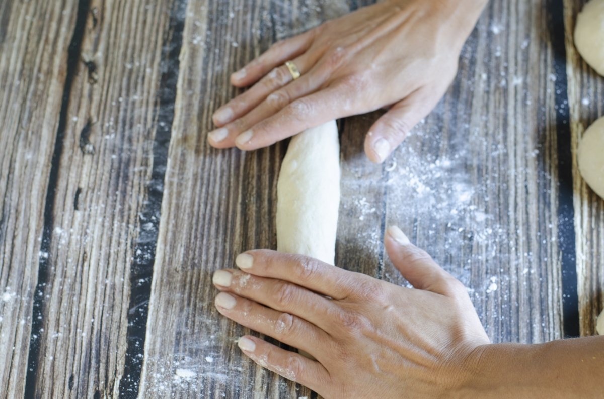 rolling and finishing the shape of the loaves of bread