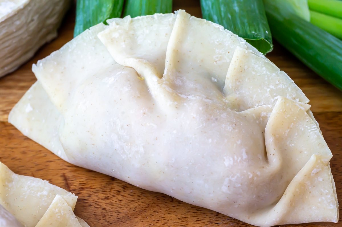 Seal filled dumplings with pleats