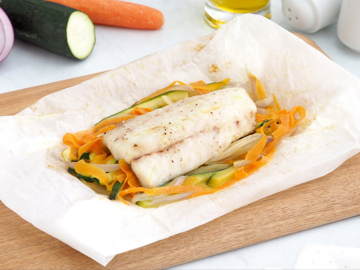 Servir la corvina en papillote