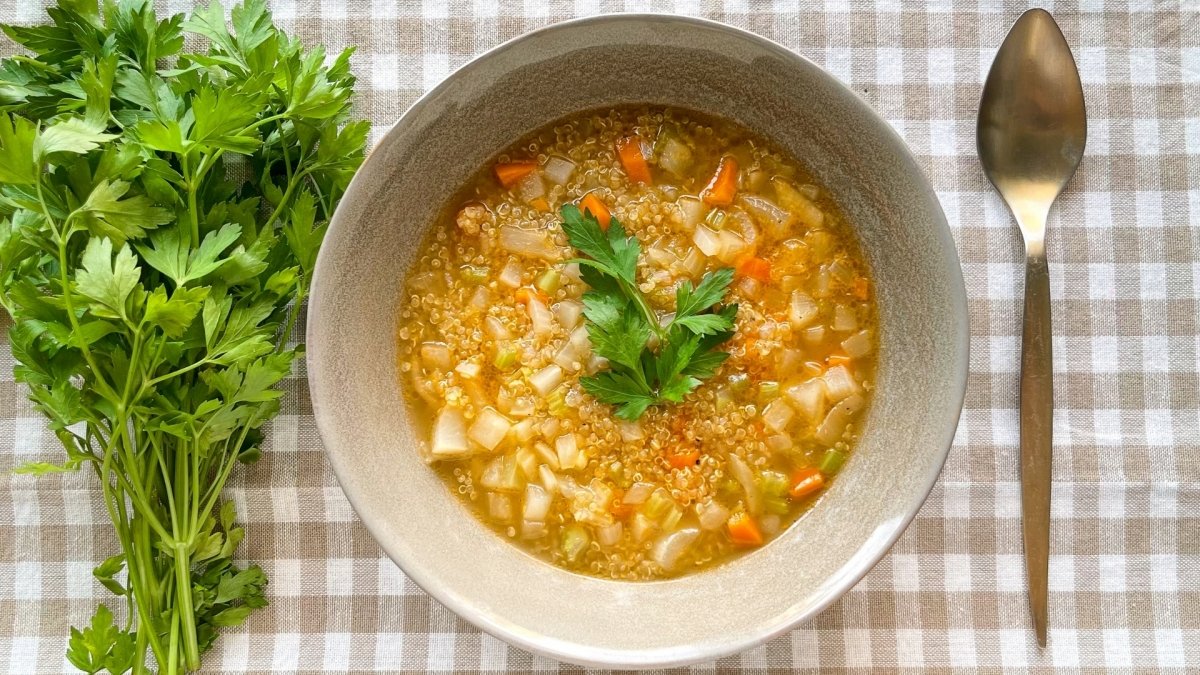 Quinoa soup decorated with parsley