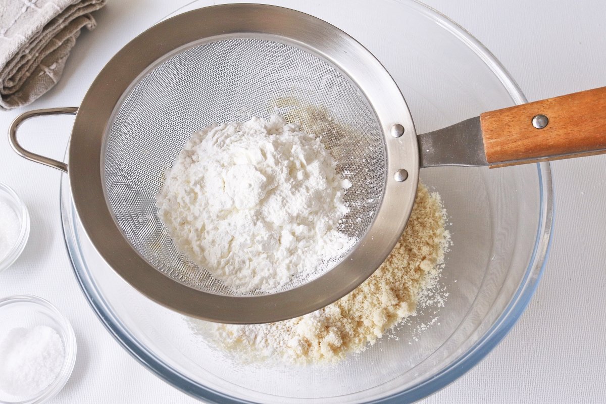 Sift the flours to mix the dry ingredients